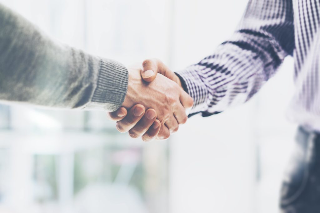 business men shaking hands